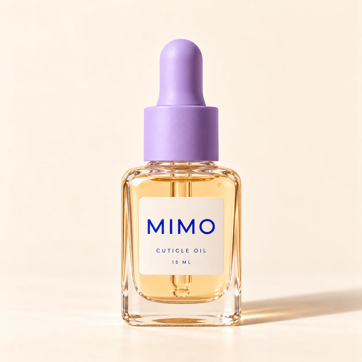 MIMO Cuticle Oil: a glass dropper bottle with a lavender dropper and a cream label.