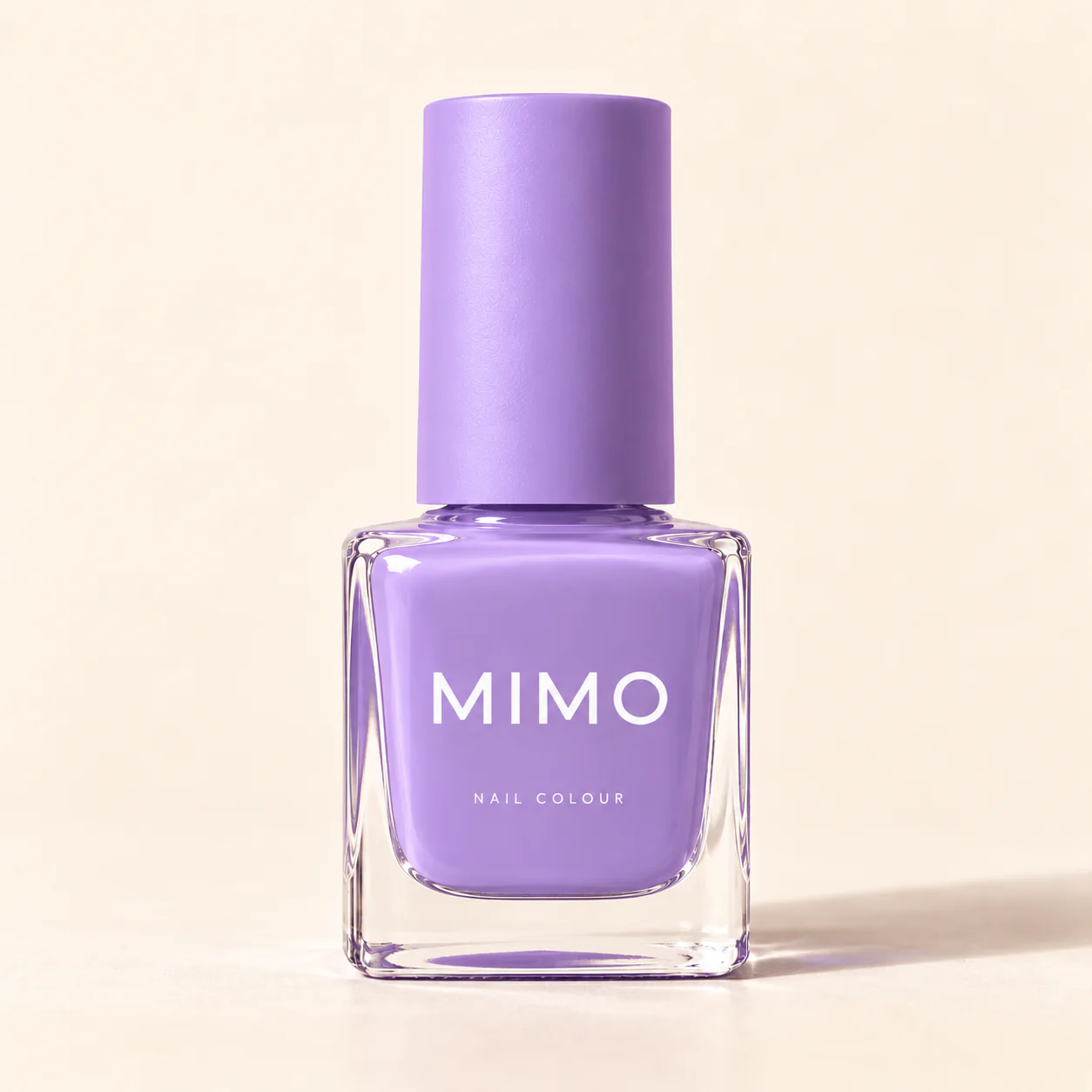 MIMO Nail Colour in Lavender: a square glass bottle with a matching cap on a cream background.